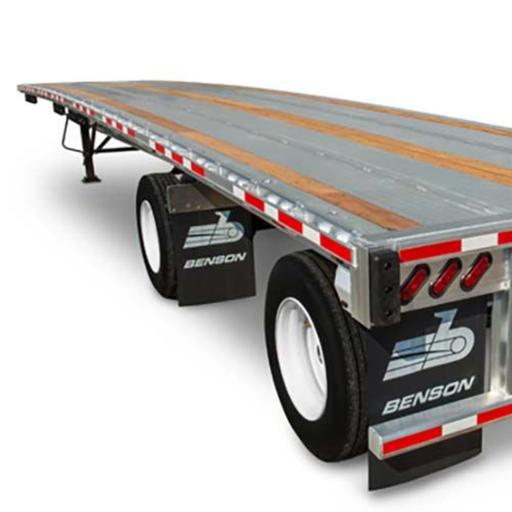 Why does the bed of some empty flatbed trucks curve upwards in the middle?