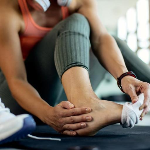 How do cushy running shoes cause stress fractures?