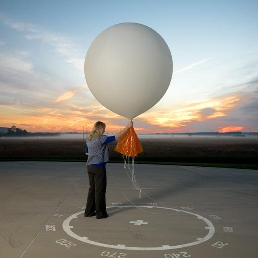 How do weather stations predict the weather?