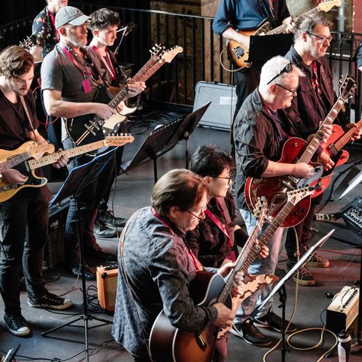 Shellie Morris sings for our little ones and Tim Brady composes for 100 electric guitars