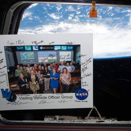 Mission Control "Houston" with Mission Control Specialists Mark and Rita Schrock
